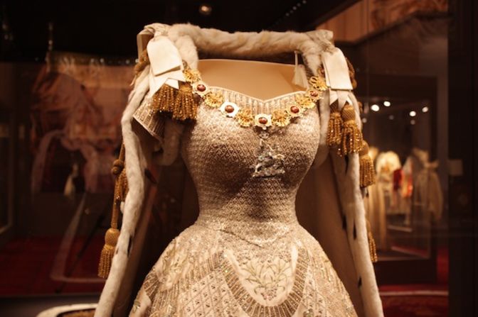 The white satin dress with embroidered national and Commonwealth floral emblems and attached pearls, crystals and sequins.