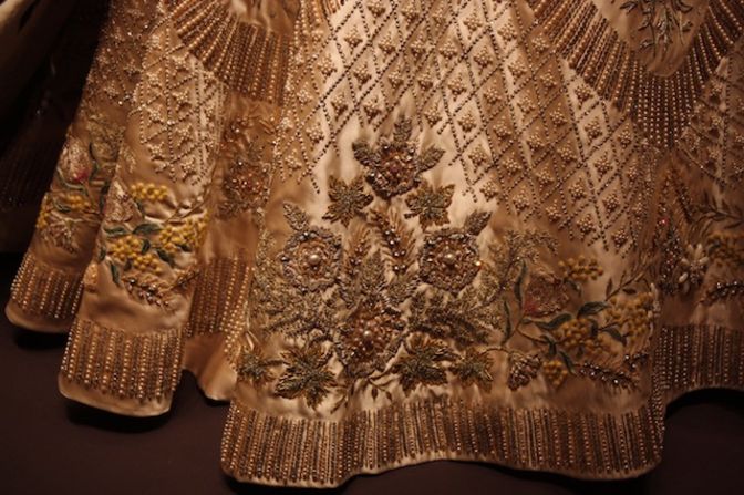 Detailed embroidery of the queen's coronation dress.