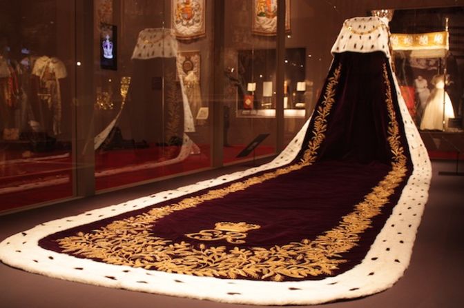 The tail of the purple velvet robe that the queen wore on her way to Buckingham Palace.