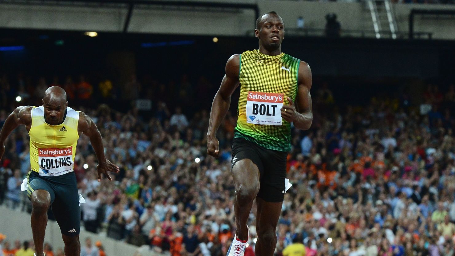 Usain Bolt crosses the line first in the 100m event at the London Anniversary Games in a time of 9.85 seconds.