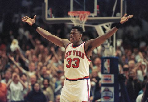 Patrick Ewing celebrates the New York Knicks' victory over the Chicago Bulls during the NBA Eastern Conference semifinals in May 1994. 