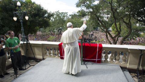 Pope Francis waves to the faithful from the balcony of St. Joaquim in Rio de Janeiro on July 26.
