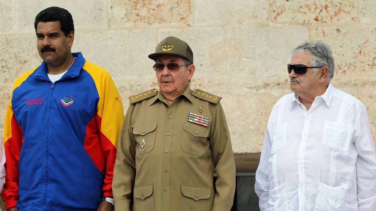 Cuban President Raul Castro (C), and his counterparts from Venezuela, Nicolas Maduro (L), and Uruguay, Jose Mujica, attend a ceremony  in Santiago de Cuba on Friday.