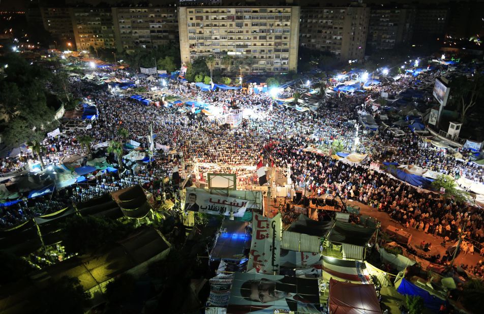 Supporters of Egypt's deposed President Mohammed Morsy gather for prayers at Nasr City, where protesters have installed a camp and hold daily rallies, in Cairo, on Sunday, July 28.