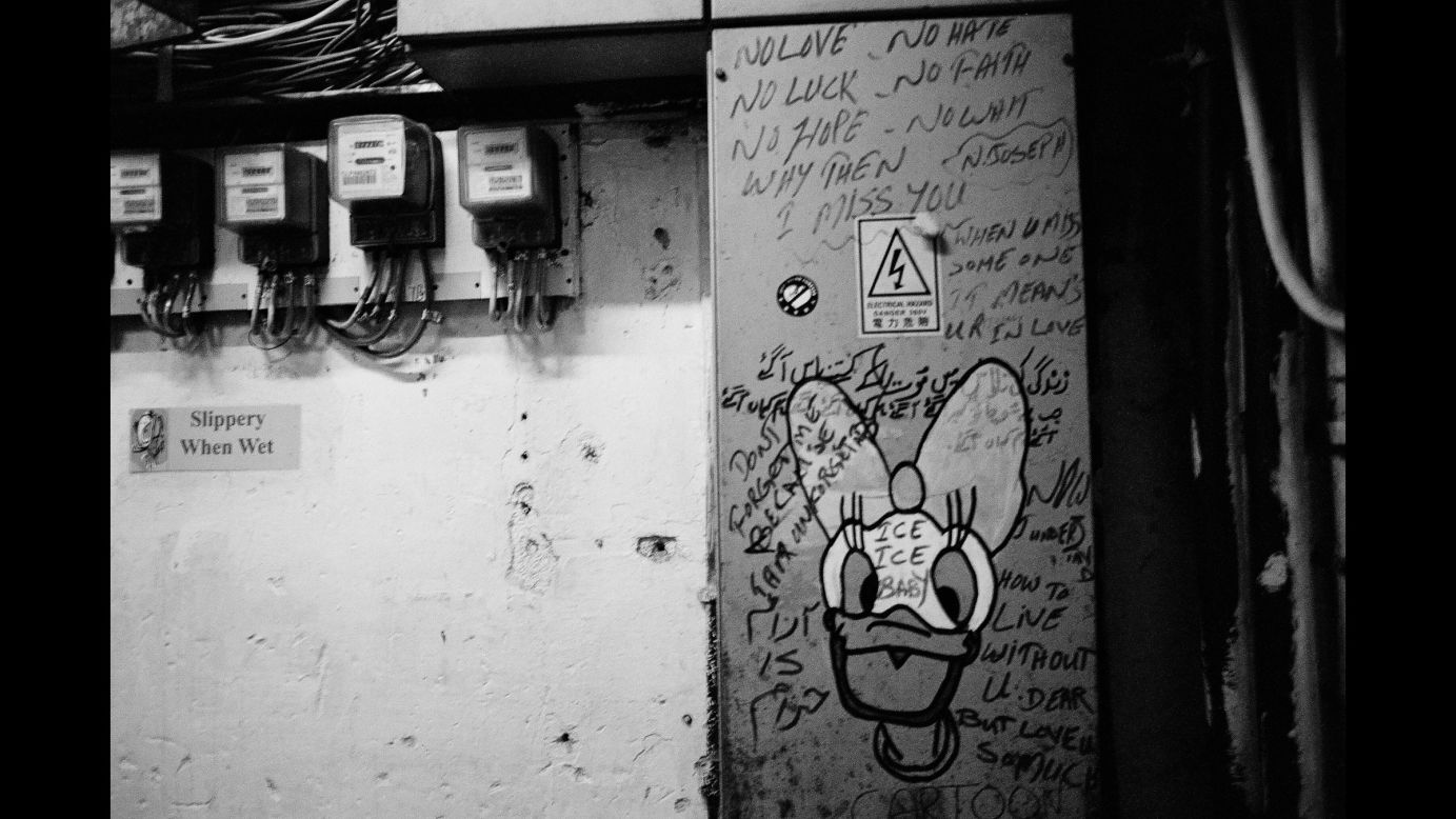 Multilingual graffiti is common in Chungking Mansions. Along with drawings of Disney characters, vandals often leave poems or messages for friends and lovers.