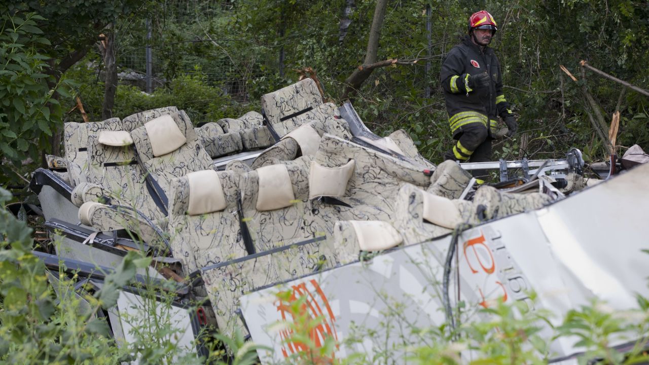 A firefighter inspects the wreckage on July 29.