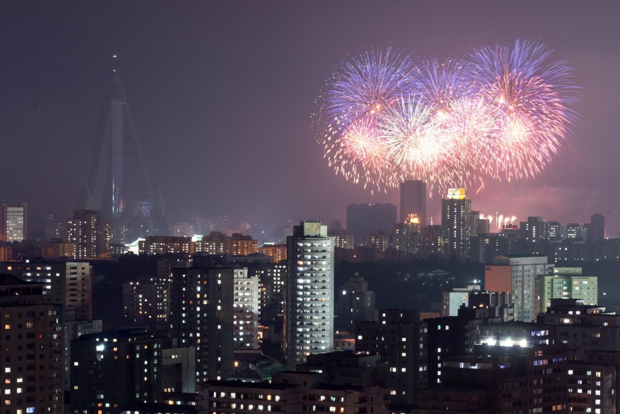 Fireworks explode above the Pyongyang skyline on Saturday, July 27. North Korea mounted its largest military parade to mark the 60th anniversary of the armistice that ended fighting in the Korean War, displaying its long-range missiles at a ceremony presided over by leader Kim Jong Un. 