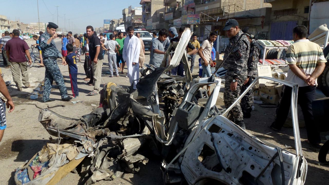 Rubble lies in a street after a car bomb explosion in Sadr City, Baghdad, on Monday.