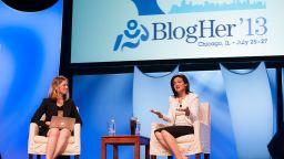 Facebook Chief Operating Officer Sheryl Sandberg, right, chats with Lisa Stone at the 2013 BlogHer conference in Chicago. Sandberg is among the highest-paid female executives in the country. Click through the gallery for more top women earners: