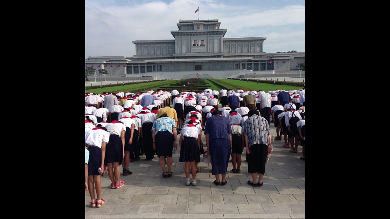 Schoolchildren pay their respects at Pyongyang's <a href="http://instagram.com/p/cLmS-gBqO3/" target="_blank" target="_blank">Kumsusan Palace of the Sun</a>, where Kim Il Sung and Kim Jong Il lie in state in glass coffins.