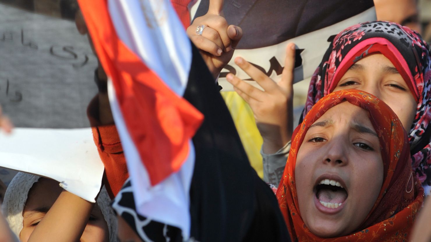 Supporters of ousted Egyptian President Mohamed Morsy chant slogans at a march in Cairo's eastern Nasr City on Monday.