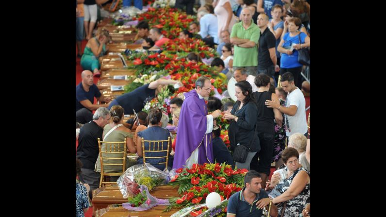 An estimated 5,000 people turned out for the Pozzuoli funeral, held in a sports arena, a police official says.