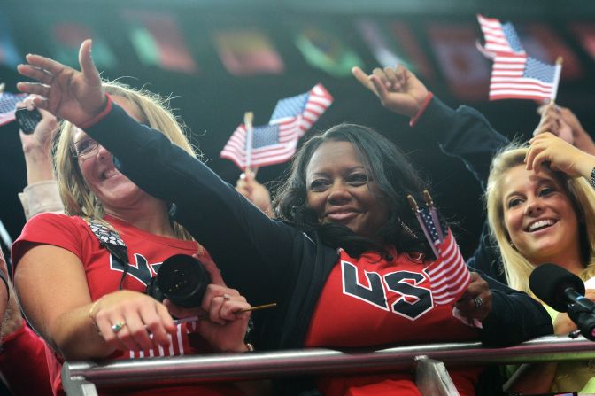 Her mother Natalie Hawkins was left crying tears of joy after watching the teen win two gold medals at the London 2012 Olympics. Hawkins is pictured with Missy Parton (left) -- the mother of Gabby's host family while training in Iowa. 