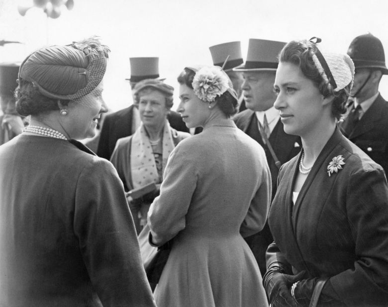 Here Queen Elizabeth is flanked by her mother and her late sister Princess Margaret (right) at the Epsom Derby in 1955.  