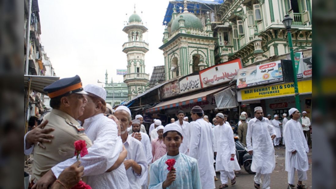 This <a href="http://ireport.cnn.com/docs/DOC-1012383" target="_blank">moment of brotherly love</a> was taken by Anupama Kinagi in Mumbai, India: "Muslims had just offered prayers and were wishing each other a very happy Eid. It is absolutely fine to hug and wish strangers on this auspicious occasion. The police officer specially arranges for rose flowers and greets Muslims outside Masjid on this special day. The Muslims accept their wishes and thank them for their extraordinary service," said the 37-year-old graphic designer. 