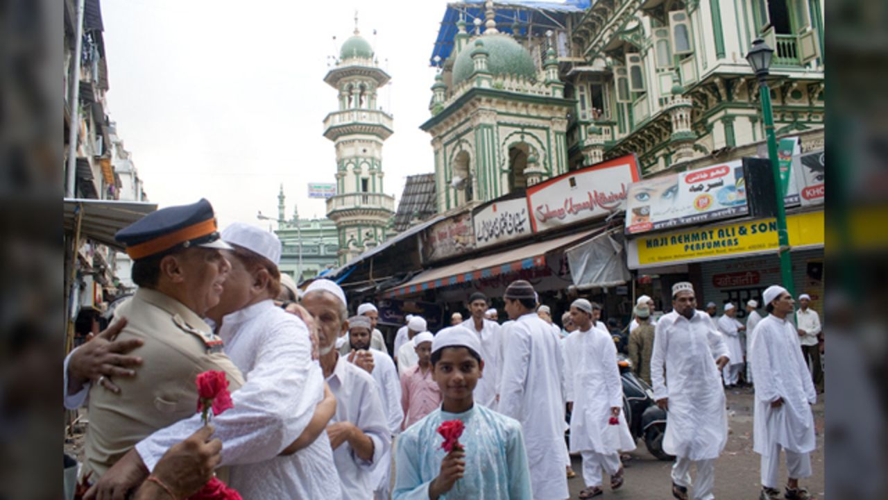 This <a href="http://ireport.cnn.com/docs/DOC-1012383" target="_blank">moment of brotherly love</a> was taken by Anupama Kinagi in Mumbai, India: "Muslims had just offered prayers and were wishing each other a very happy Eid. It is absolutely fine to hug and wish strangers on this auspicious occasion. The police officer specially arranges for rose flowers and greets Muslims outside Masjid on this special day. The Muslims accept their wishes and thank them for their extraordinary service," said the 37-year-old graphic designer.