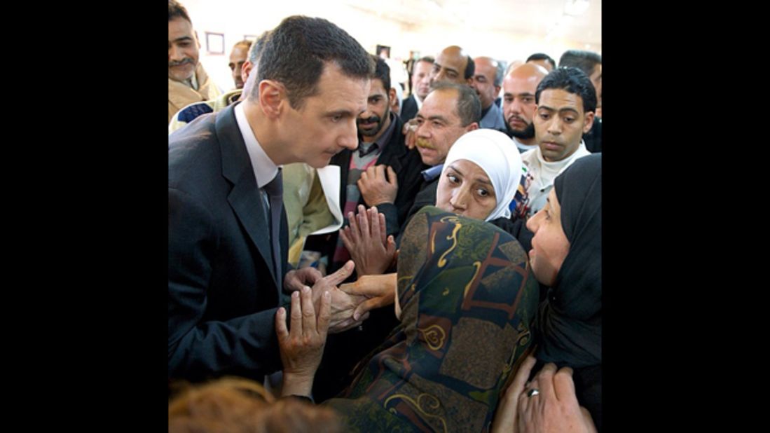 On his new Instagram account, Syria's President Bashar al-Assad is seen greeting and listening intently to a group of women.