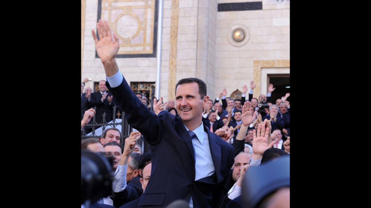 Al-Assad smiles and waves to what appears to be an appreciative crowd. Among his 69 posts so far, there's not a single battlefield in sight -- despite the civil war which has torn his country apart for more than two years.