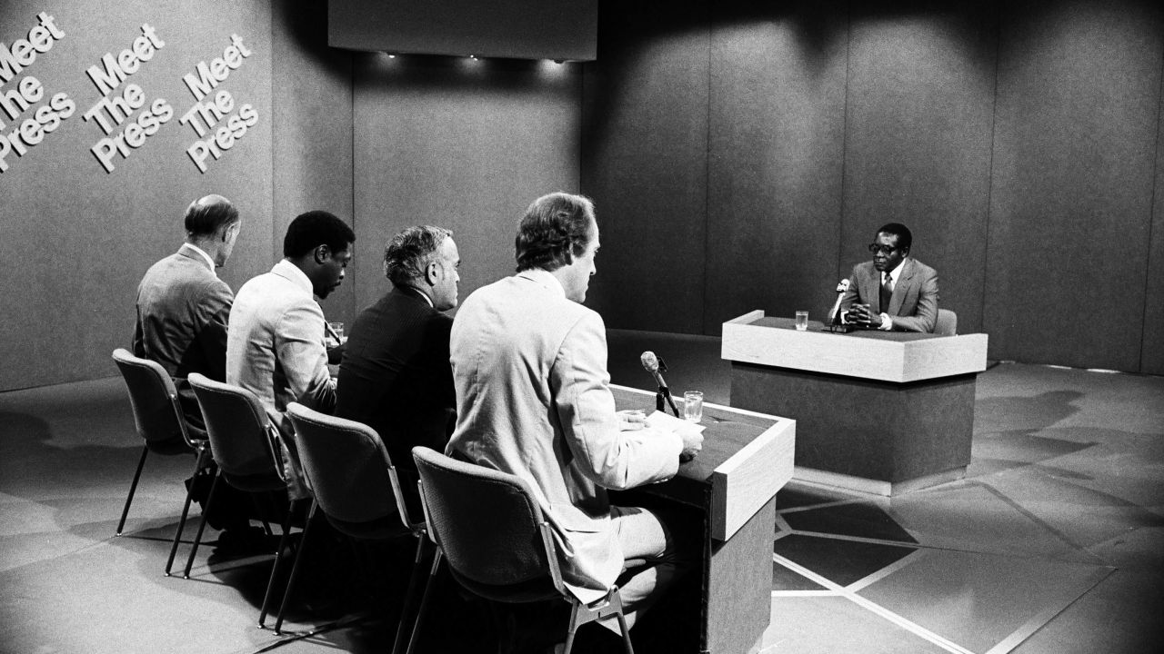From left, NBC News moderator Bill Monroe, Newsday's Les Payne, the Chicago Sun Times' Robert Novak and NBC News' Garrick Utley speak with Mugabe during an episode of "Meet the Press" in 1980.