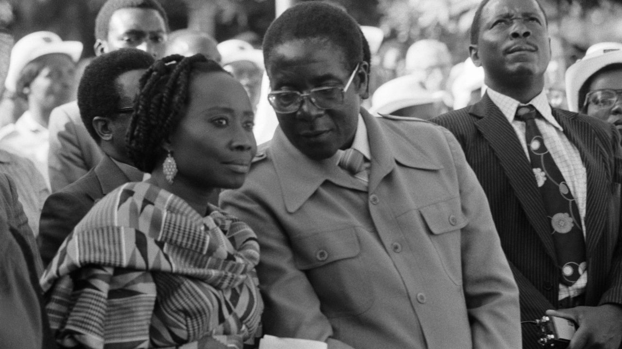 Mugabe speaks with his first wife, Sally, during an event in Salisbury in 1980. The pair were married until Sally died in 1992. They had one son, who died at age 4.