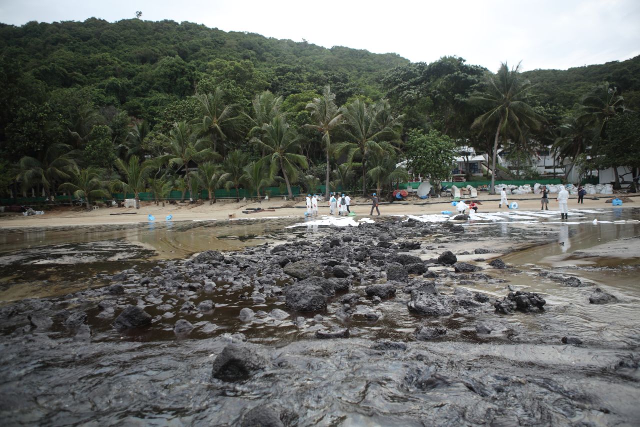A major oil spill on Sunday, July 28, coated Ao Phrao beach on the popular tourist island of Koh Samet in northern Thailand. Authorities estimate that around 50,000 liters (13,200 gallons) of crude oil was leaked from an offshore pipeline belonging to PTT Global Chemical, Thailand's largest petrochemical producer, and 5,000 liters (1,320 gallons) have washed onto the white sand beaches of the island.