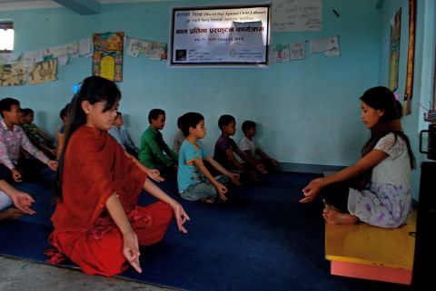 The children at Nepal Goodweave Foundation start their day with yoga before they leave for school. According to coordinator Rajkumar Khadka, yoga is a stress reliever for the children, who are former child laborers.
