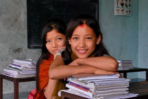 Former child laborers Maya Lama (front) and Rita Tamang became good friends after arriving at Nepal Goodwave Foundation's transit house. When they grow up, the girls said they want to become counselors and help children like themselves.