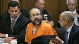 Ariel Castro listens during the sentencing phase of his trial on August 1 in Cleveland alongside defense attorneys Craig Weintraub, left, and Jaye Schlachet. Castro held three women captive for years inside his Ohio home until their escape in May 2013. He pleaded guilty to 937 counts, including murder and kidnapping. On September 4, Castro was found dead inside his prison cell in Orient, Ohio.