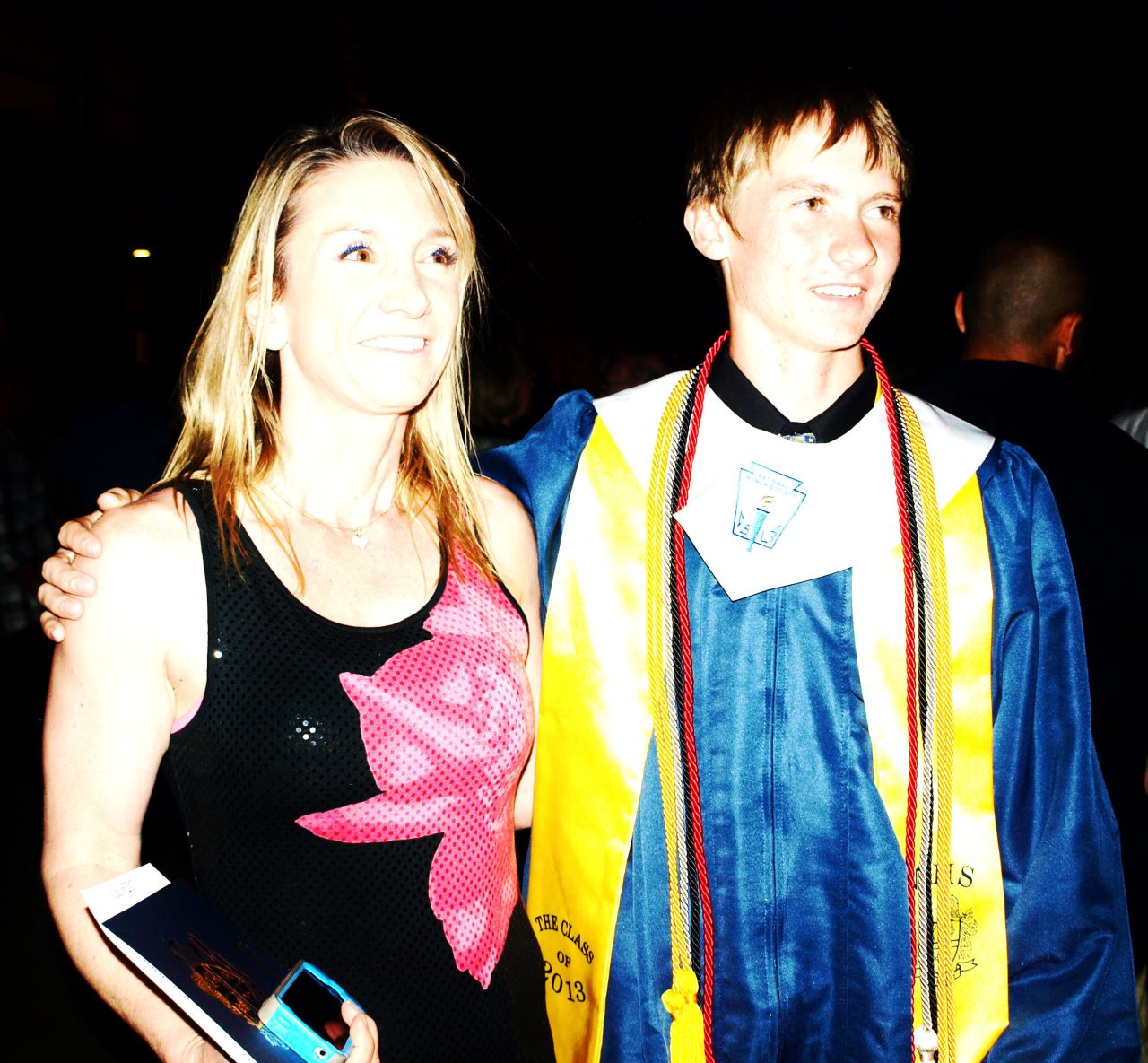 Mitchell and her son pose for a photo at his  high school graduation. "I've been telling him most of these things all along, and I guess it was just one last chance to tell him 'remember this' or 'stay-the-course, kid,' " she said.