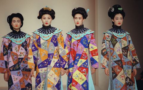 Models wear re-created robes from China's Yuan dynasty, which lasted from  A.D. 1279 to 1368. The area shares the same climate as Angkor, which collapsed about the same time. 