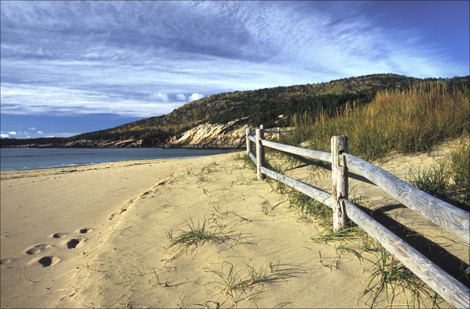 Acadia National Park's Sand Beach in Maine consists mostly of sand made from the ocean surf pounding on shell fragments for thousands of years. There are hiking trails on both sides of the beach.  