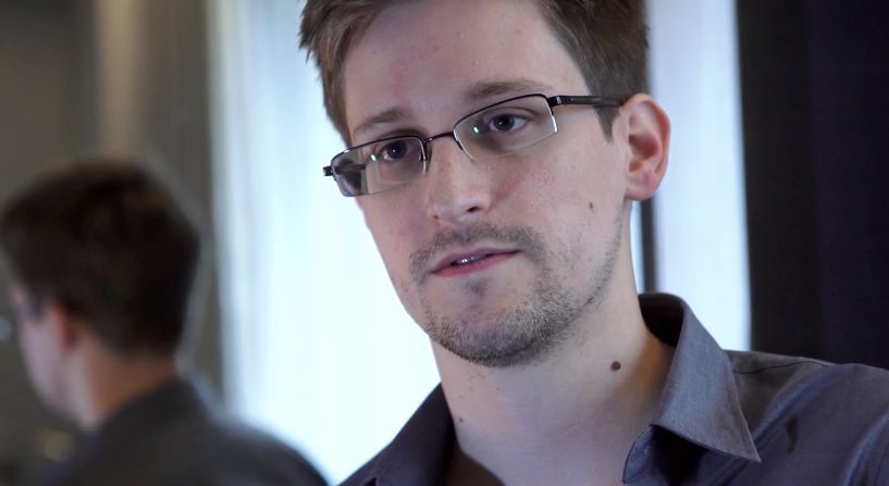 Edward Snowden, the man who leaked top-secret details about U.S. surveillance programs, has been charged with three felony counts, including violations of the U.S. Espionage Act. He left the United States and hid out in Hong Kong until WikiLeaks helped him move to Moscow, where he lived in an airport for about five weeks before being granted <a href="index.php?page=&url=http%3A%2F%2Fwww.cnn.com%2F2013%2F08%2F01%2Fus%2Fnsa-snowden%2Findex.html">temporary asylum in Russia</a> in August 2013. Snowden has said he is afraid he would not get a fair trial if he came back to the United States.