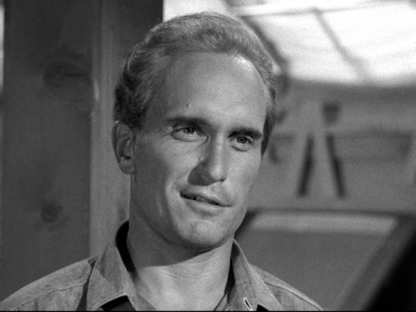 "Robert Duvall was not handsome, but he was attractive. He could be a bad guy, he could be a good guy," Dougherty said of the Oscar-winning actor, pictured in a 1963 episode of "The Fugitive."
