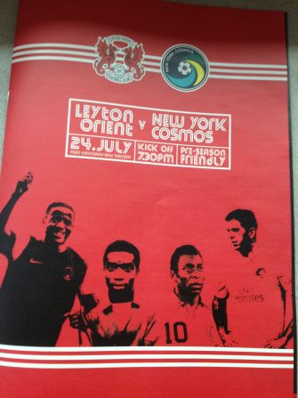 The match program at Leyton Orient's Matchroom Stadium celebrates the arrival of its prestigious opponents.