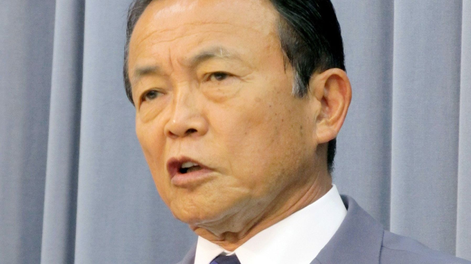 Japanese Deputy Prime Minister and Finance Minister Taro Aso at a cabinet meeting at Aso's office in Tokyo on August 2, 2013.