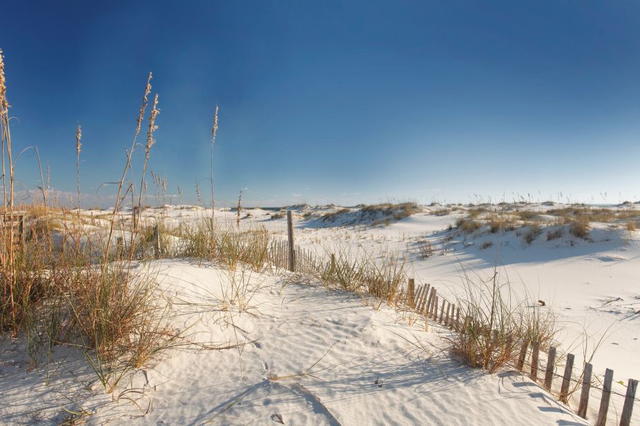 <a href="http://www.alapark.com/gulfstate/Gulf%20State%20Park%20Pier/" target="_blank" target="_blank">Alabama's Gulf State Park </a>in the city of Gulf Shores features a two-mile white sand beach for swimming; more than seven miles of backcountry trails for walking and biking; and camping and lodging facilities for people who want to spend more time at the park. 