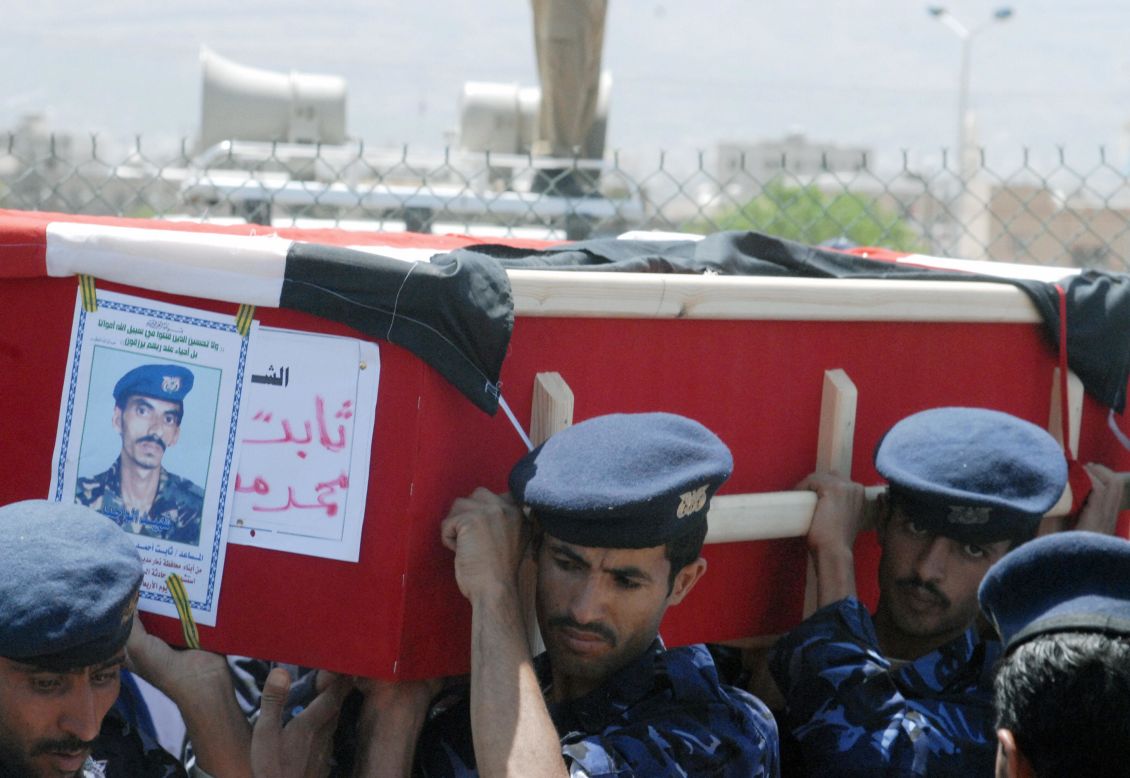 Yemeni soldiers carry the coffin of a comrade during a funeral on September 25, 2008, in Sanaa. Heavily armed fighters attacked the <a href="http://www.cnn.com/2008/WORLD/meast/09/17/yemen.blast/index.html">U.S. Embassy in Yemen</a> on September 17. A car bomb was detonated, killing 10 Yemeni police and civilians and six attackers.