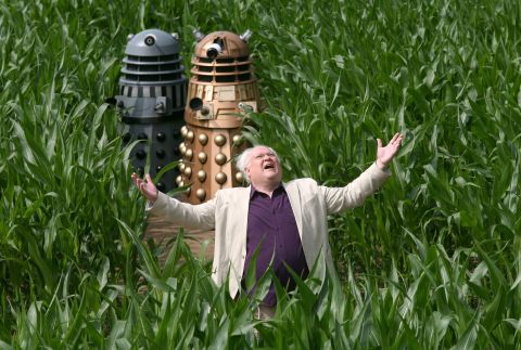Colin Baker, who played the sixth Doctor from 1984-1986, poses with Daleks on July 12, 2013 in York, northern England.