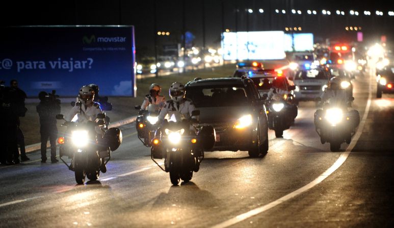 A motorcade carries the coffin of Ecuador football star Christian Benitez through the capital Quito.