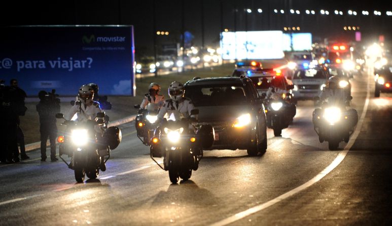 A motorcade carries the coffin of Ecuador football star Christian Benitez through the capital Quito. 