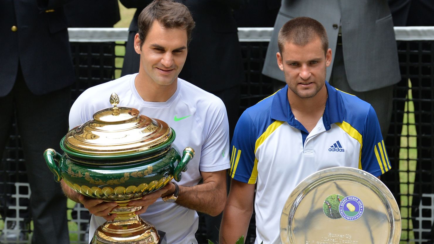 Roger Federer's only title in 2013 came when he beat Mikhail Youzhny, right, in Halle, Germany in June. 