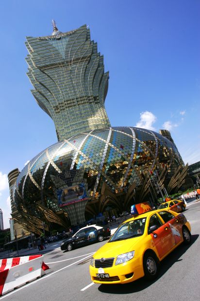 <strong>Height</strong>: 261 meters.<br /><strong>Cost to build</strong>: $385 million.<br /><strong>Completion date</strong>: 2008.<br /><strong>Fast Fact</strong>: Designed by Hong Kong architects Dennis Lau and Ng Chun Man, the golden structure combines the visual effects of crystals, fireworks and the long plumes of a Brazilian headdress -- all symbols of prosperity to guide the money home.