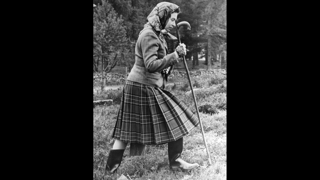 Queen Elizabeth II walks cross country on the grounds of Balmoral Castle in this October 1967 photo.