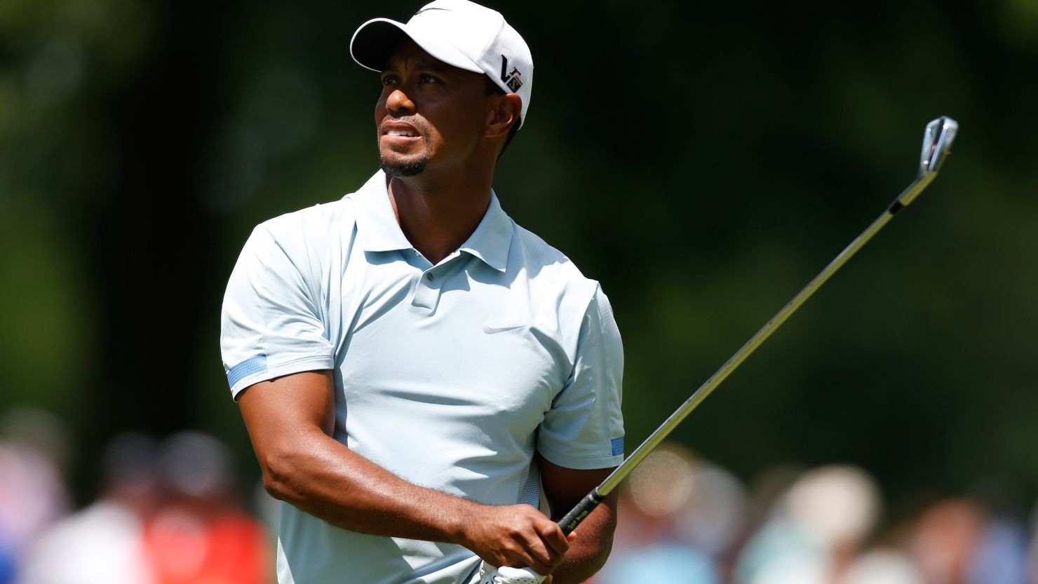 Tiger Woods eyes his ball anxiously during Saturday's third round at the Firestone Country Club. 