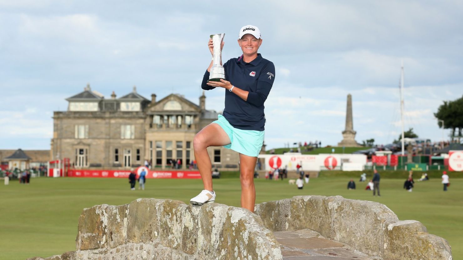 Stacy Lewis of the United States poses with the trophy on the Swilcan Bridge after winning the Women's British Open.