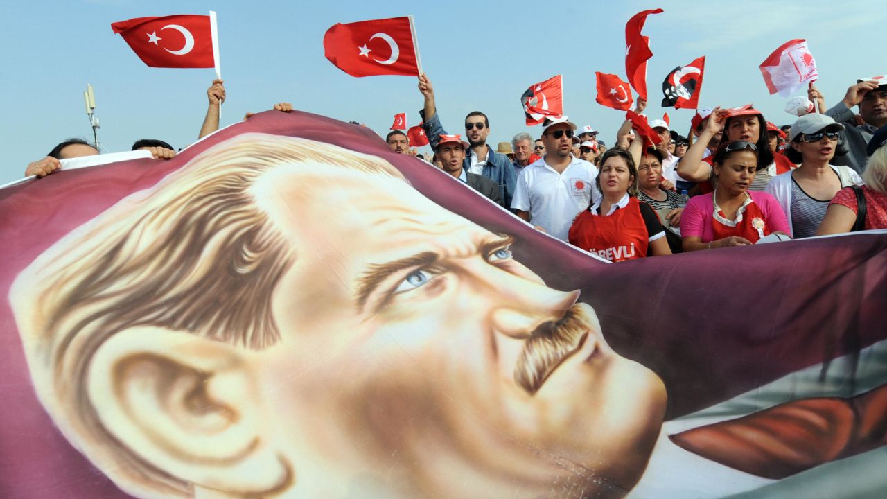 Opponents of the Ergenekon investigation demonstrate with a portrait of Mustafa Kemal Ataturk in Istanbul in 2009.