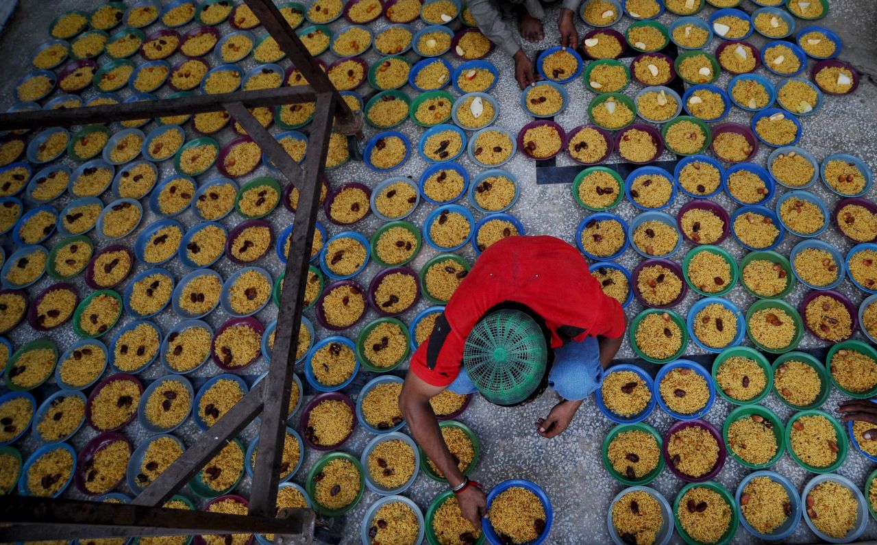 A young man arranges bowls of food before Iftar in Pakistan's second largest city Lahore. Pakistan is the world's second most populous Muslim country; Indonesia has the highest percentage of Muslims. 
