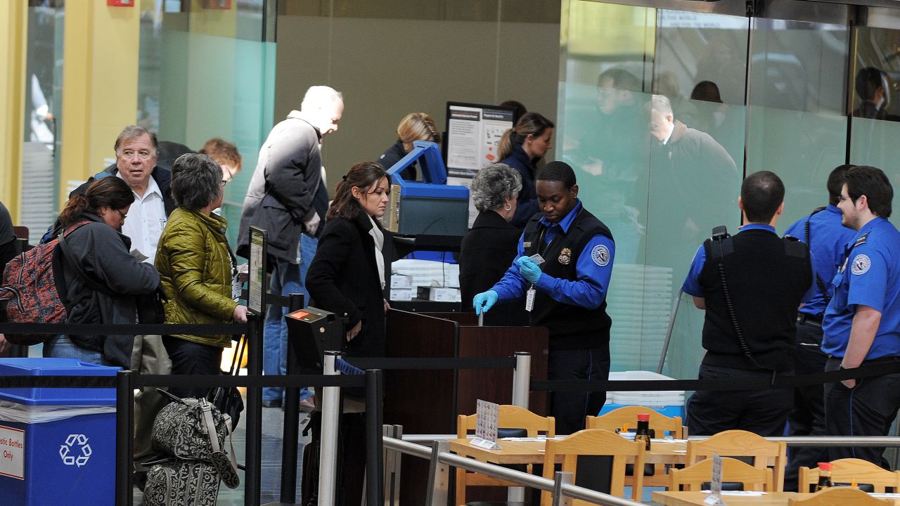 Transportation Security Administration officers work at the Ronald Reagan National Airport in Washington, D.C., on March 4.

