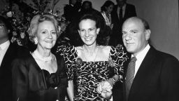 Katharine Graham, who led the Post for more than two decades, left, poses with her daughter, journalist and socialite Lally Weymouth, and Barry Diller, chairman of 20th Century Fox, at a party in 1988.