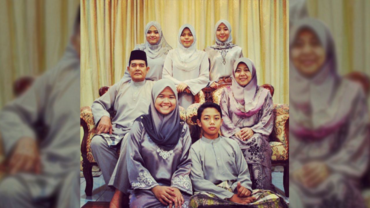 Dina Syazwani Sipal Anuwar, a 24-year-old teacher from <a href="http://statigr.am/viewer.php#/user/175523476/" target="_blank" target="_blank">Selangor in Malaysia</a>, took this photo of her family celebrating Eid last year. The photo means a lot to her as it was the last Eid she was able to spend with her father Sipal, a policeman, who unexpectedly passed away in January 2013. It was also the first time the family had ever managed to color coordinate their outfits. "I think it was one of the signs that father would be leaving us, last Eid we could take a perfect photo as a whole family," said  Dina, pictured top left. This year the family have decided to all wear pink. 